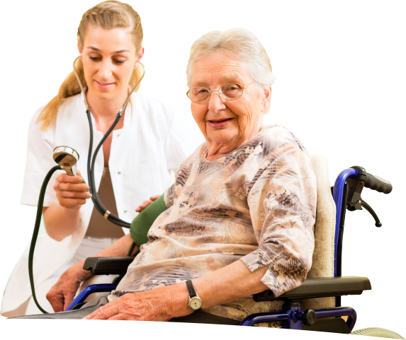 A caregiver taking the blood pressure of an elderly